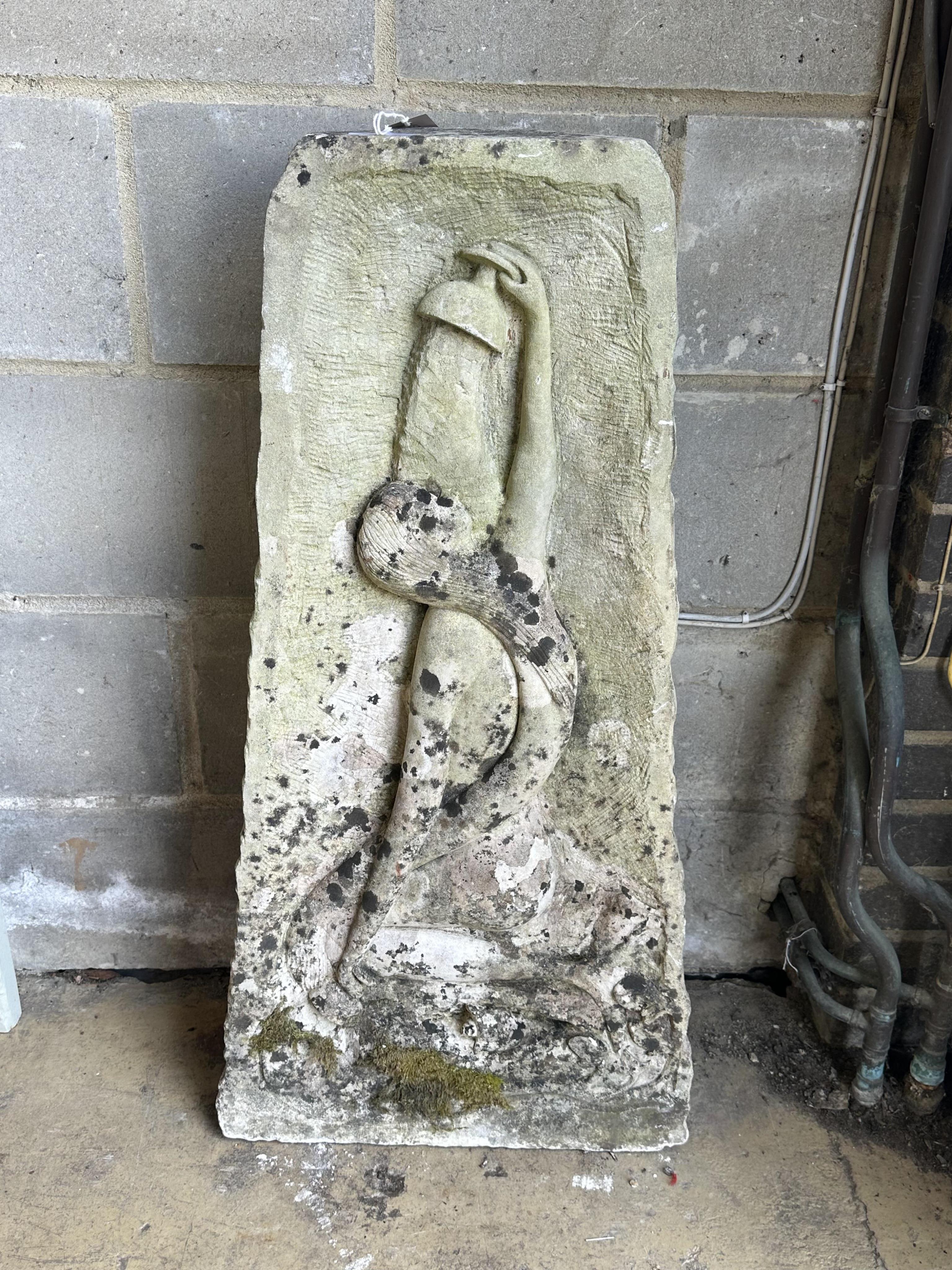 A stone corner piece decorated with a mermaid, height 90cm. Condition - fair